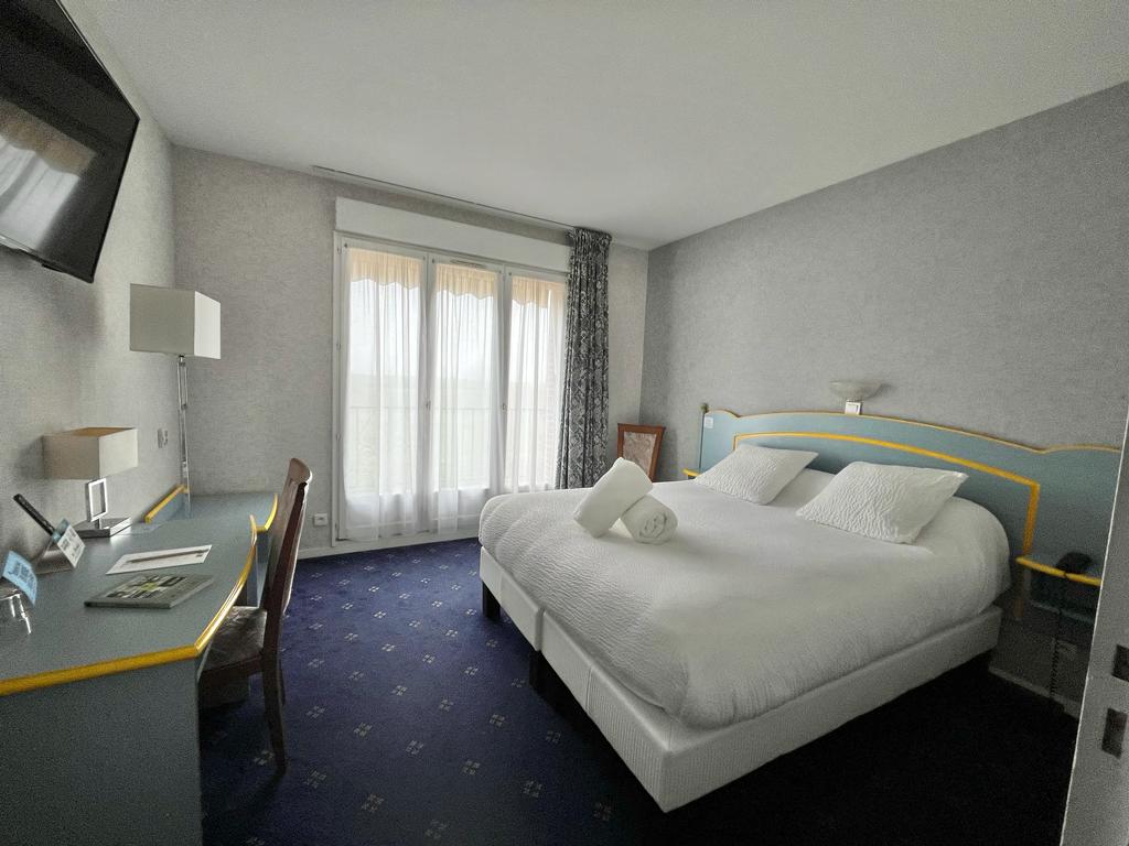 Chambre hôtel Saint père sur Loire - Crédit photo : Logis